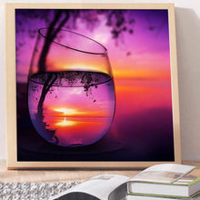 Load image into Gallery viewer, Full Diamond Painting kit | The reflection of leaves and sunrise in glass
