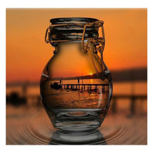 Load image into Gallery viewer, Full Diamond Painting kit | Reflection of sunset in a glass bottle
