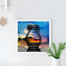 Load image into Gallery viewer, Full Diamond Painting kit | Reflection of the sunrise in a glass bottle
