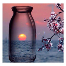 Load image into Gallery viewer, Full Diamond Painting kit | The reflection of the sunset in the glass bottle
